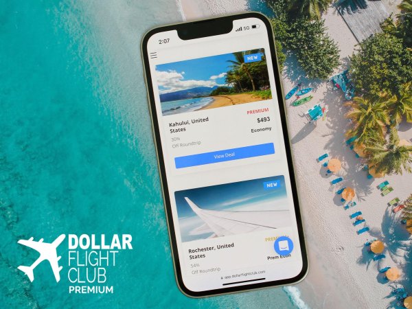 Travel deals search displayed on an iPhone with a beach background