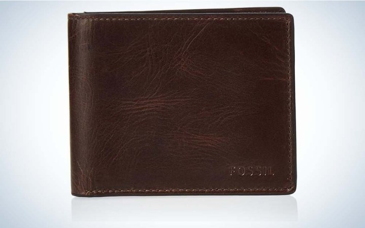  A dark brown leather Derrick Men's Wallet by Fossil on a plain background.