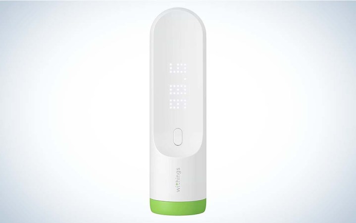  A white Withings Thermo Smart Digital Thermometer with a green ring around the bottom against a plain background.