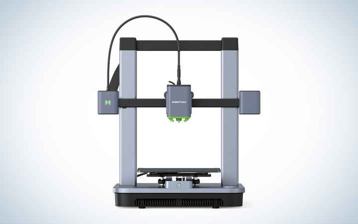  The AnkerMake M5C 3D Printer is placed against a white background with a grey gradient.