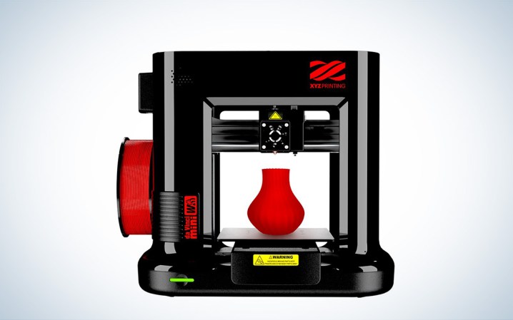  The black and red XYZprinting Da Vinci Mini Wireless 3D printer is places against a white background.