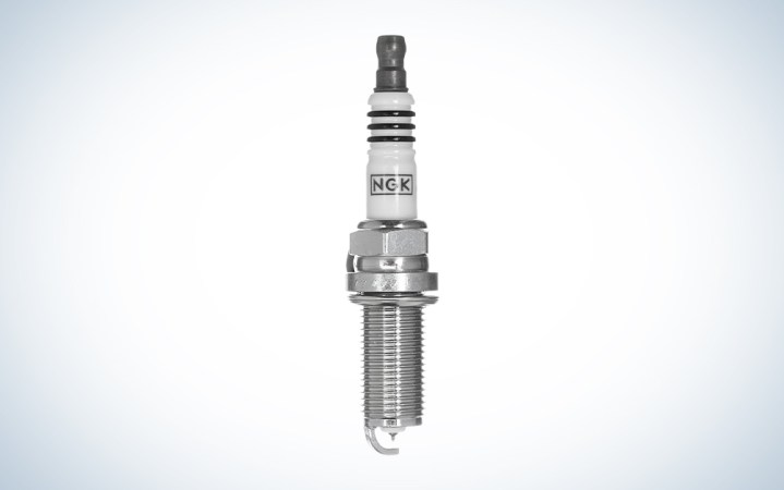  NGK Iridium Spark Plug on a white gradient background