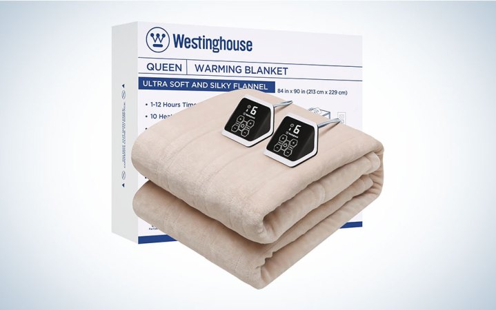  A taupe Westinghouse electric blanket with two controllers on a plain background