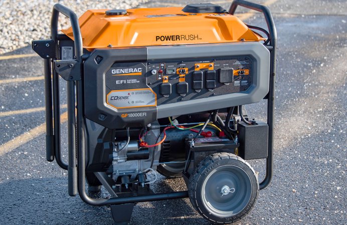  Orange and grey Generac 18000EFI portable generator on wheels in a parking lot