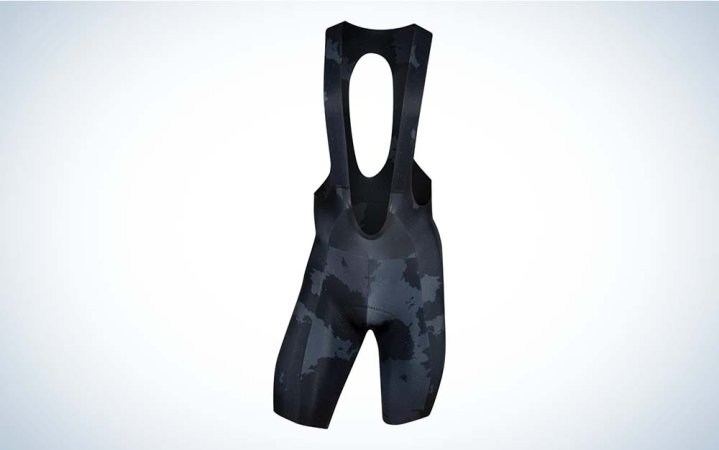  A pair of cycling shorts with a bib attached by Pearl Izumi against a plain background.