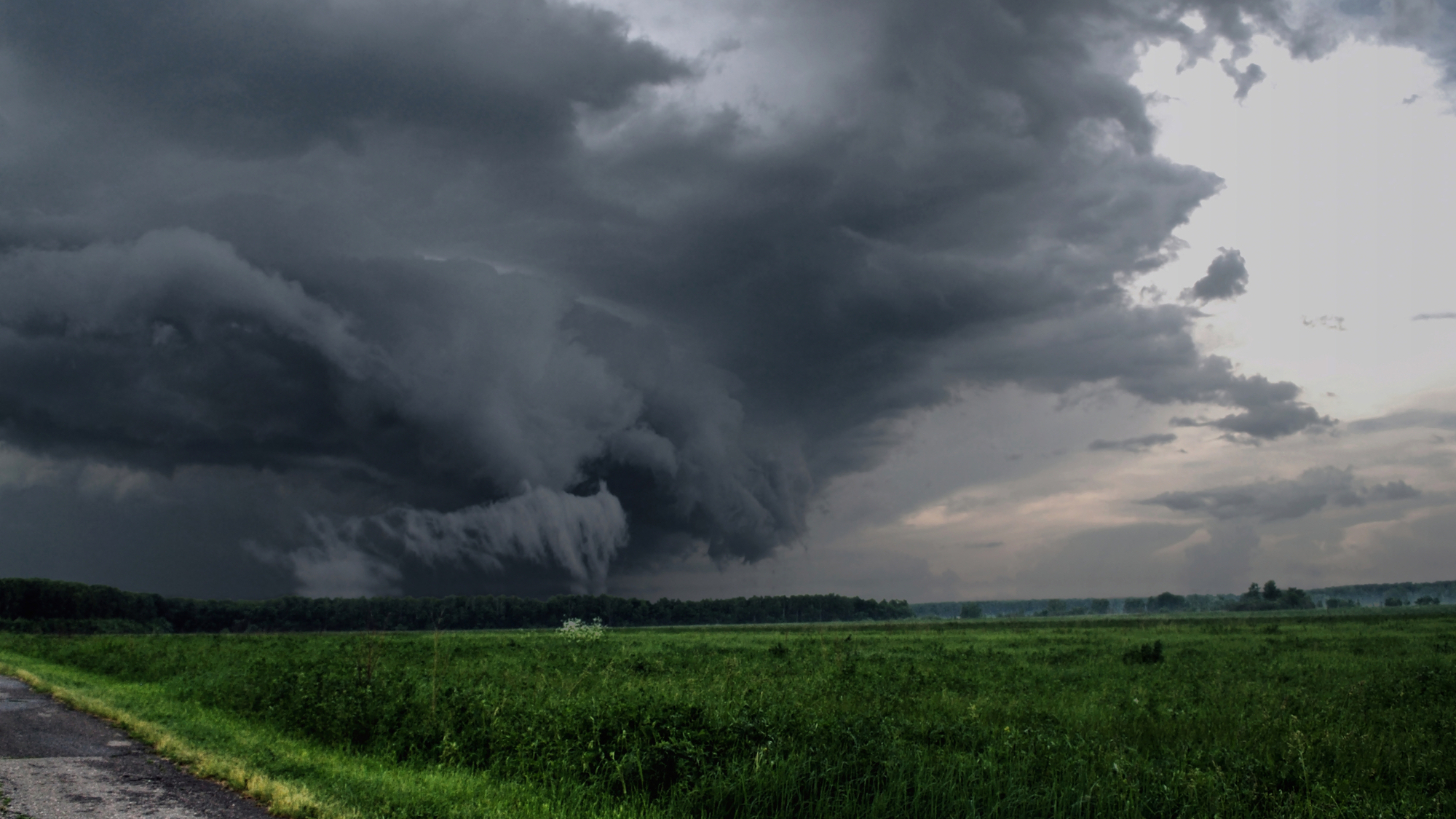 Storm coming in over farm field