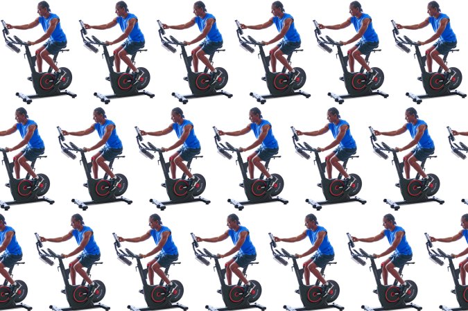 A person on a workout bike in a pattern on a plain background