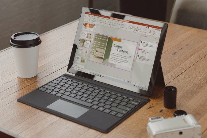 Windows Office 2019 on a Surface laptop on a wooden desk