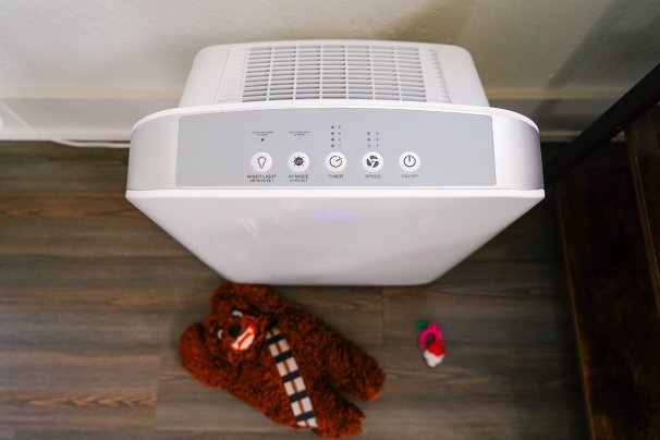 GermGuardian air purifier from above on a wood floor.