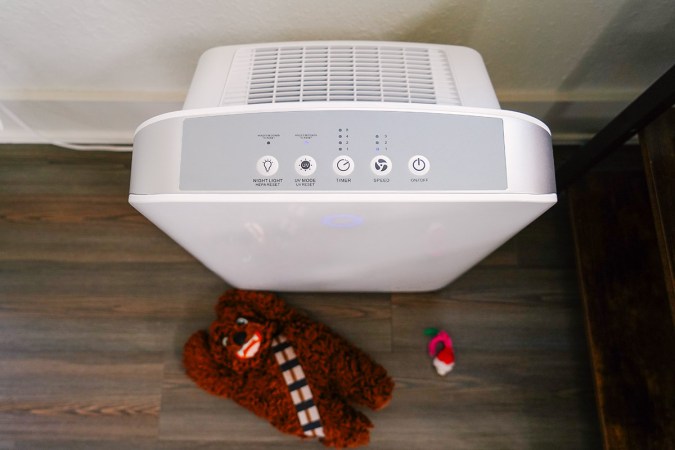  GermGuardian air purifier from above on a wood floor.