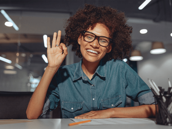 A person doing American Sign language