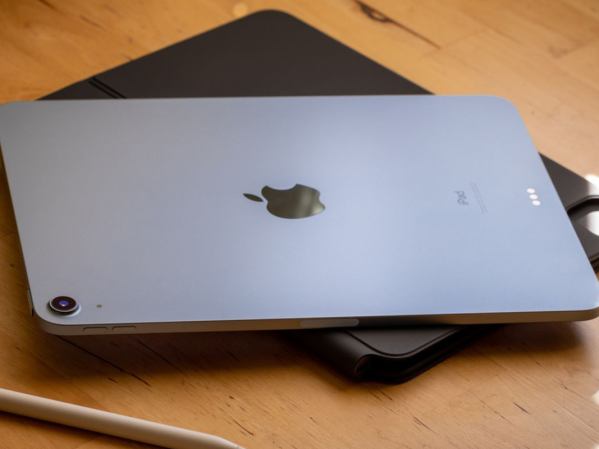 An iPad 7 on a wooden table