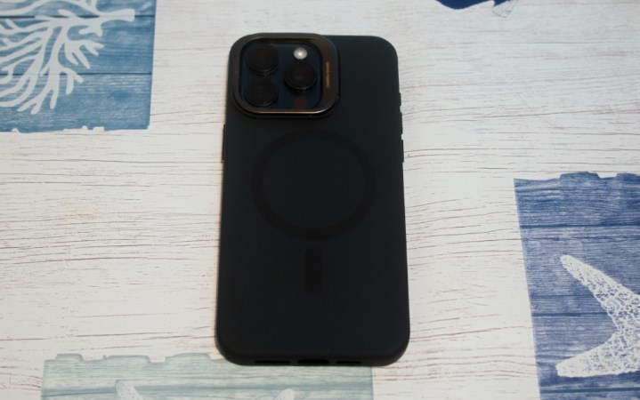  A black ESR Silicone Case With Kickstand on a table