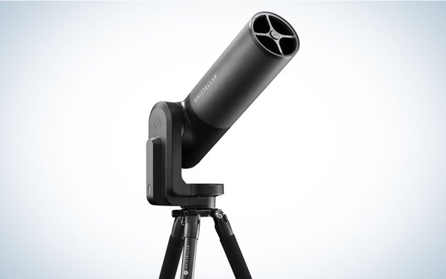 A Unistellar equinox 2 telescope on a plain background.