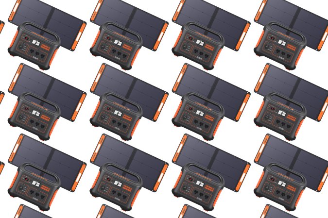The Jackery 1000 Pro solar generator with included solar panel arranged in a pattern on a plain background