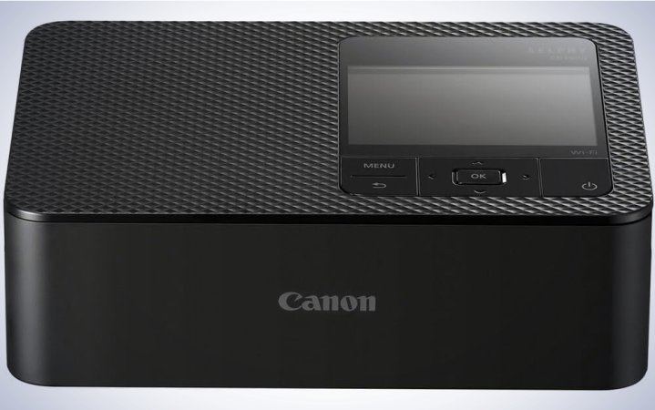  Canon's Selphy CP1500 Wireless Compact Photo Printer on a plain white background.