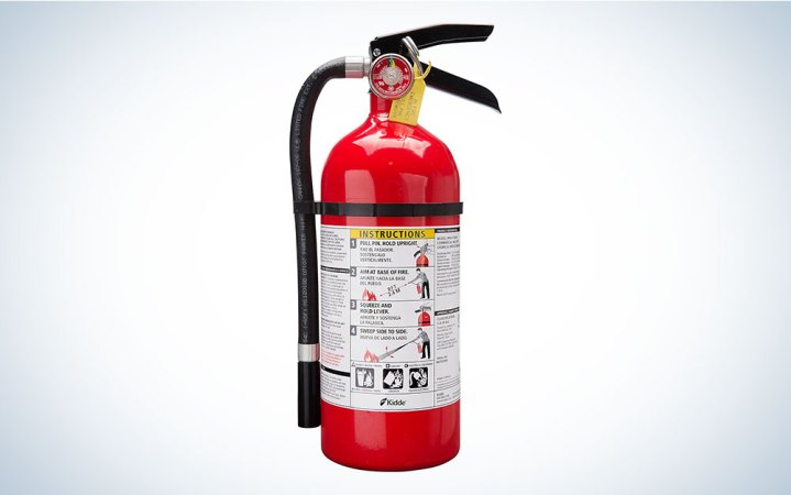  A Kidde Pro 210 fire extinguisher on a plain background.