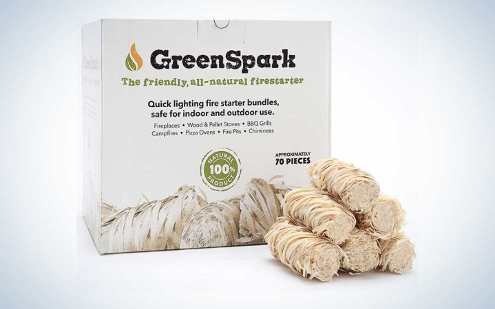  A package of GreenSpark all-natural fire starter on a plain background.