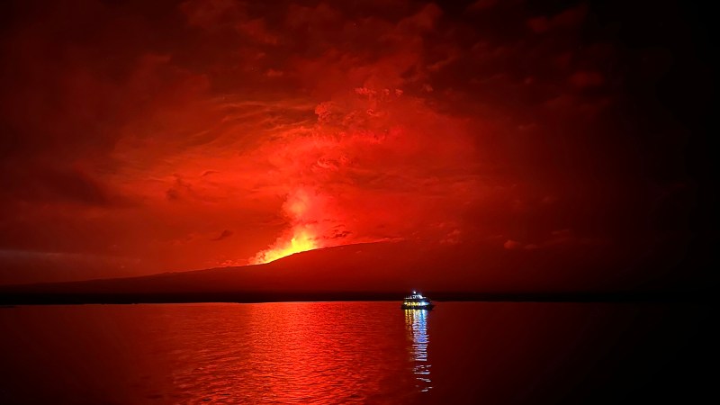 Firey lava spews out La Cumbre volcano on March 3, 2024 in Galapagos Islands, Ecuador. La Cumbre volcano, located on Fernandina Island of the archipelago, erupted on Saturday, March 2.