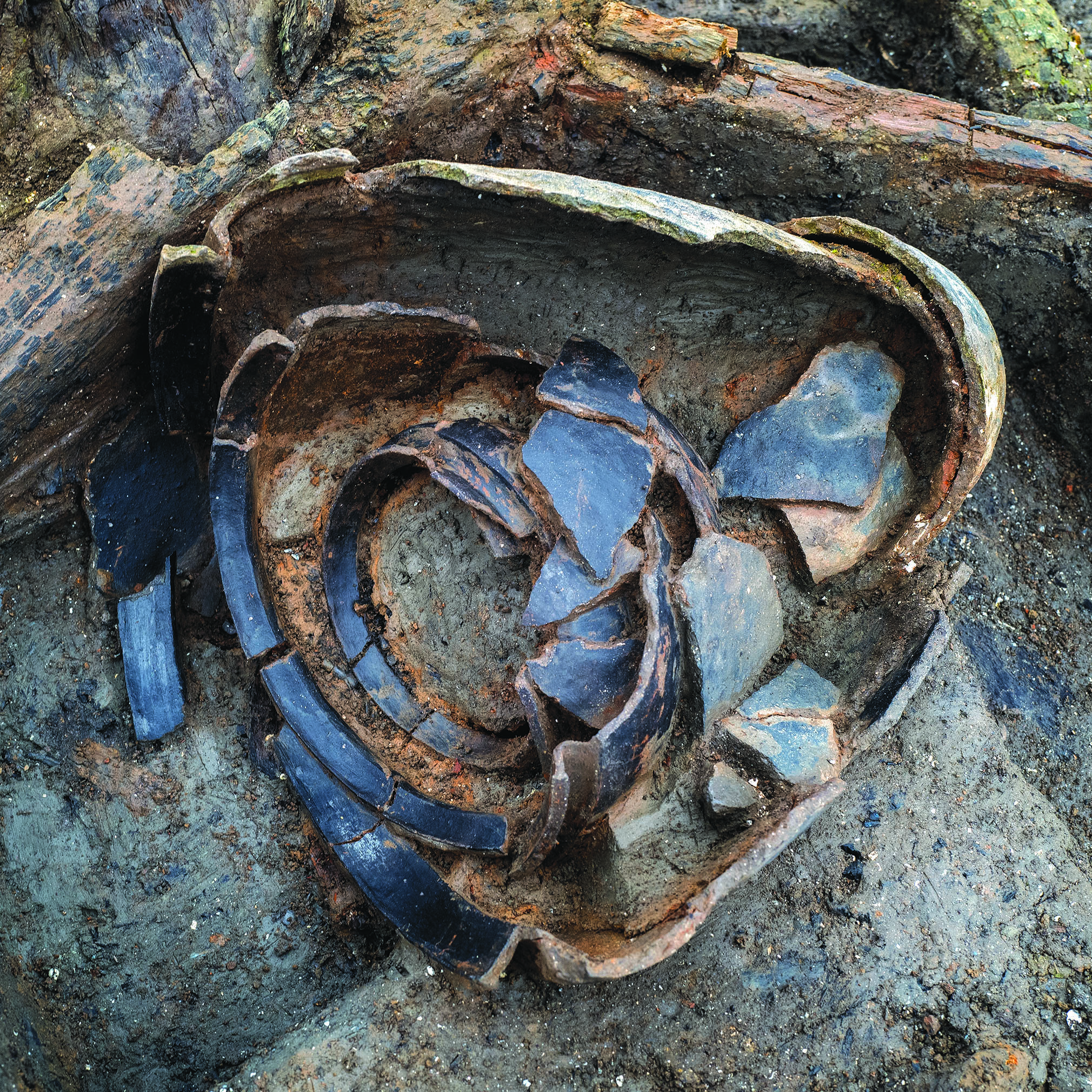 pottery stacked so that it can compactly fit inside one another