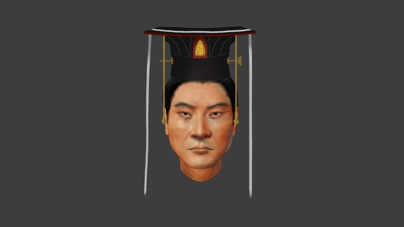 the facial reconstruction of Emperor Wu, an ancient Chinese ruler of the Northern Zhou dynasty. he has dark hair, tan skin.