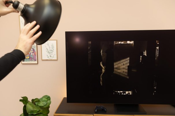 Samsung OLED with a lamp shining on it to show anti-reflective coating