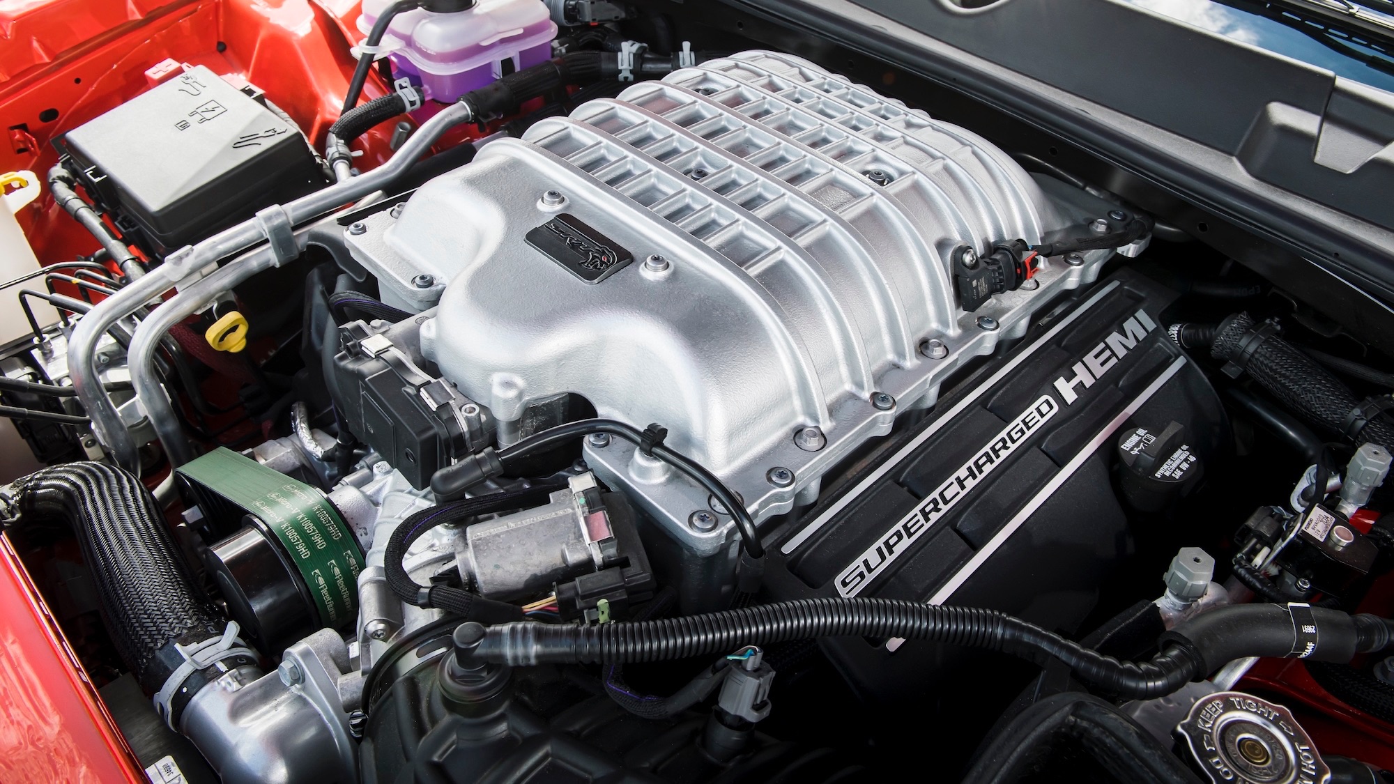 a silver engine inside a car