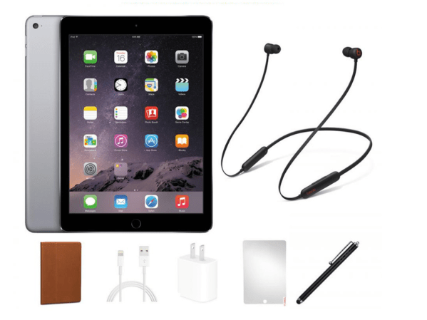 An refurbished iPad Air and pair of Beats Flex headphones on a plain background.