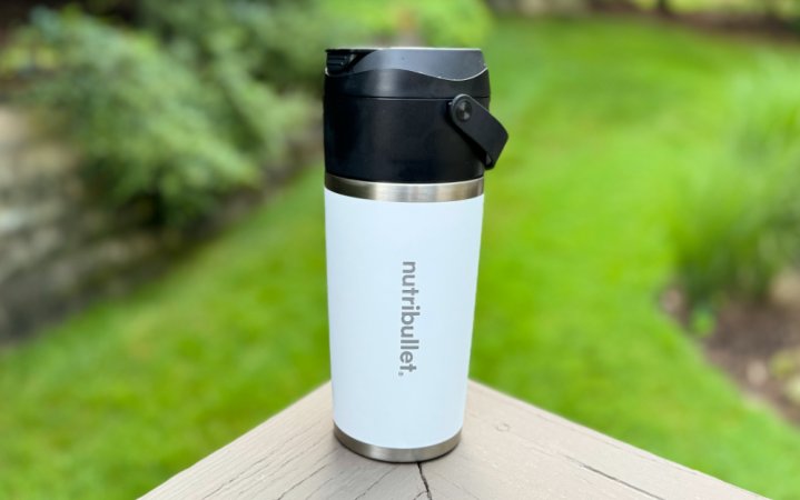  Nutribullet's Flip perched on top of a railing.