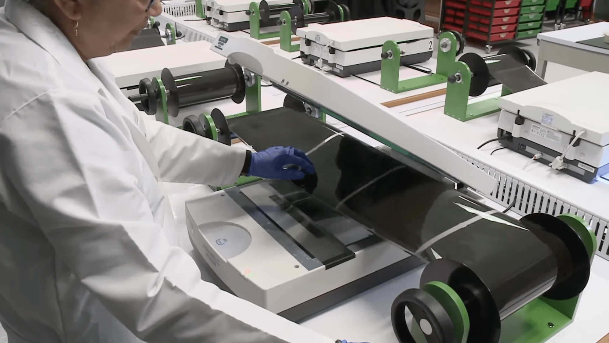 Archivist scanning documents at National Archives