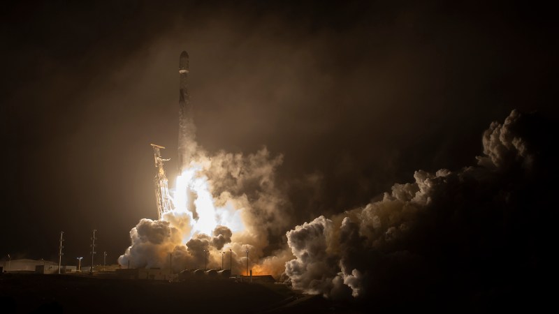 Riding atop a SpaceX Falcon 9 rocket, NASA’s Double Asteroid Redirection Test, or DART, spacecraft sets off to collide with an asteroid in the world’s first full-scale planetary defense test mission in November 2021.