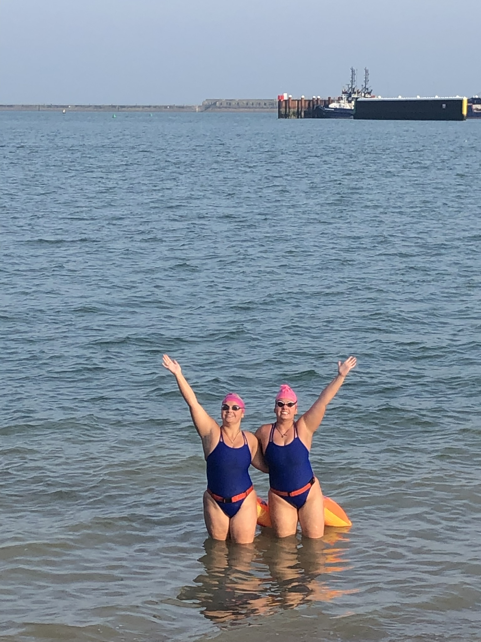 vera (left) and margaret rivard stand in the water during a training swim
