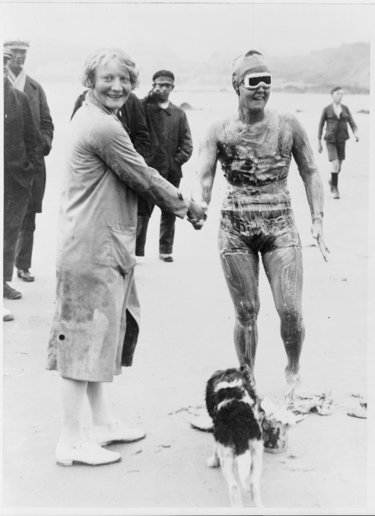 Lillian Cannon, of Baltimore, Maryland, offering her best wishes to Gertrude Ederle, as she starts out from Cape Griz Nez, France, on her successful attempt to swim the English Channel, 1926.