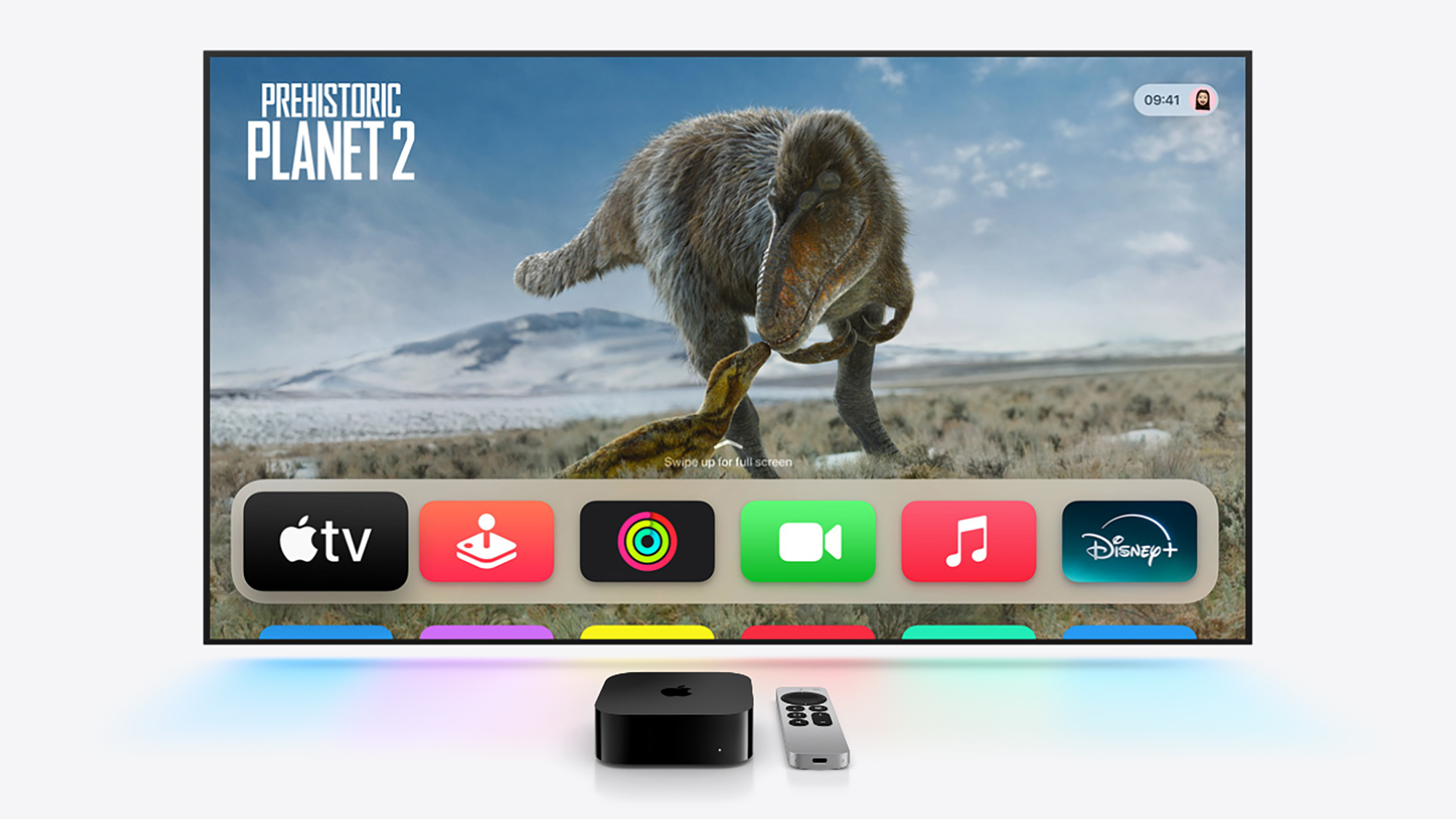apple tv with a dinosaur show and the device in the foreground