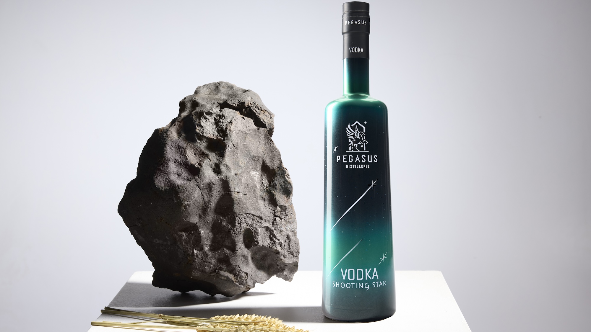 Pegasus Shooting Star Vodka promo art next to meteorite