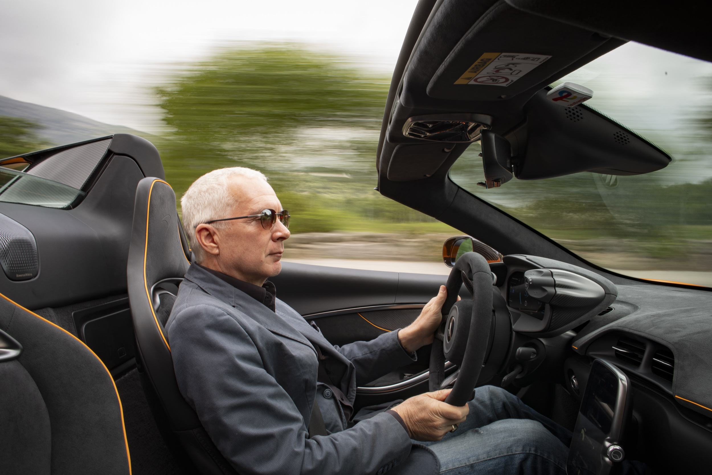 man driving car