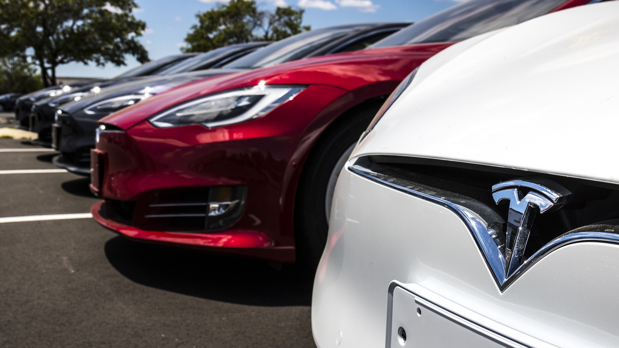 Indianapolis - Circa June 2017: Tesla Motors Local Car Dealership. Tesla designs and manufactures the Model S electric sedan III