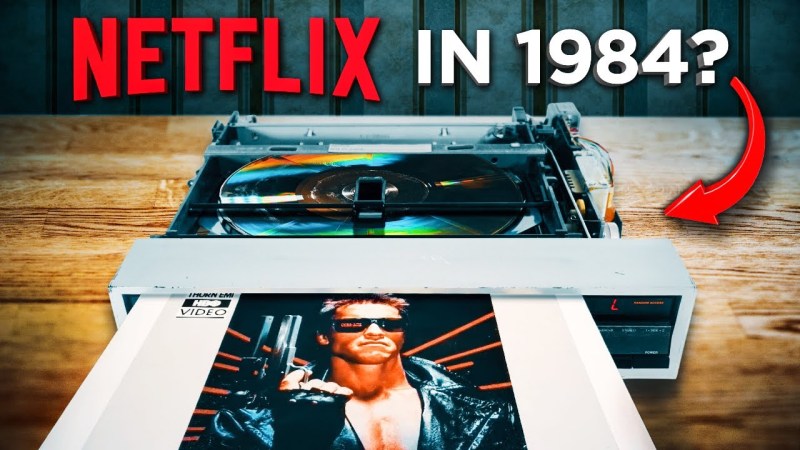 text that says 'netflix in 1984' over an image of a disc video player