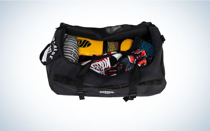  Superare gym bag full of martial arts equipment on a plain background