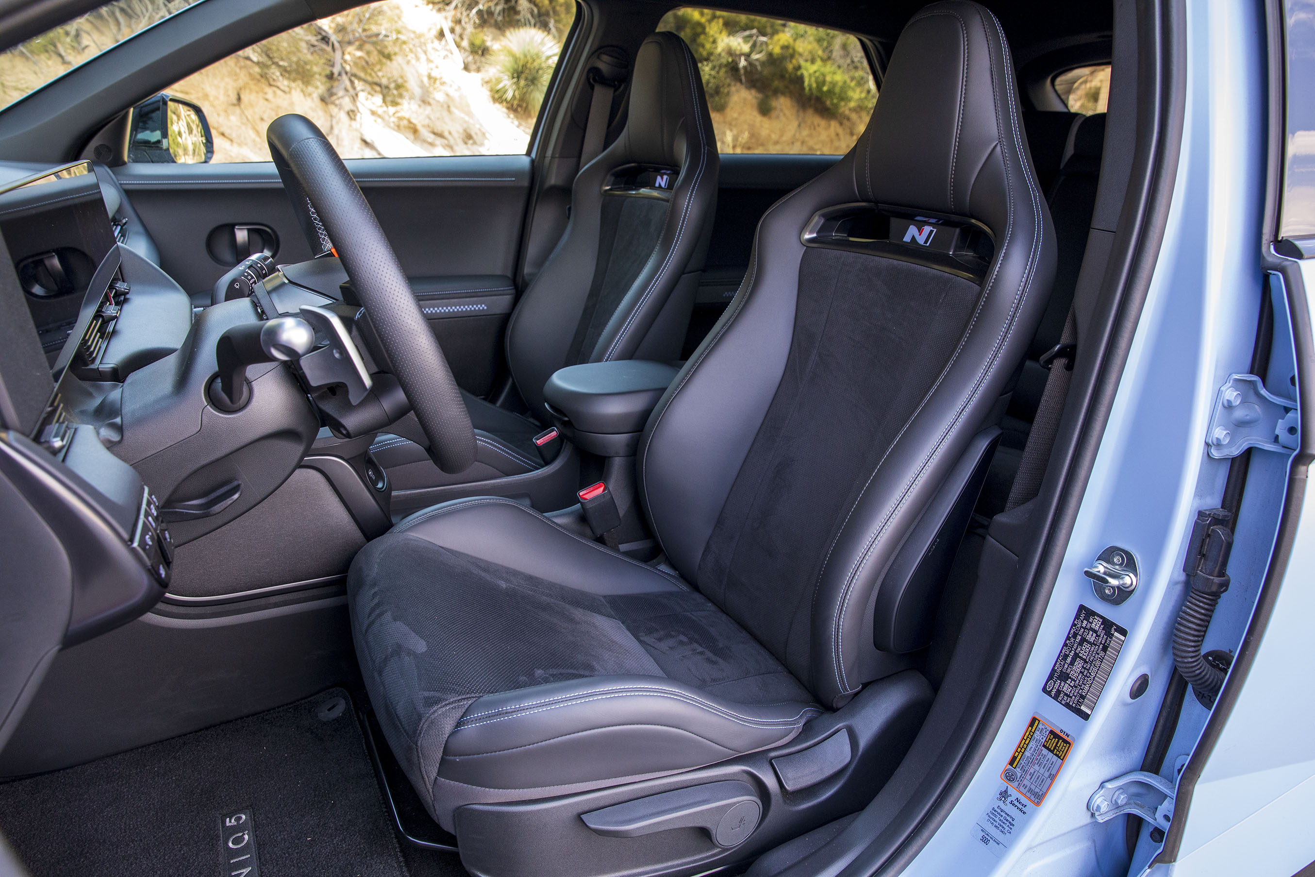 car interior showing front seats and steering wheel