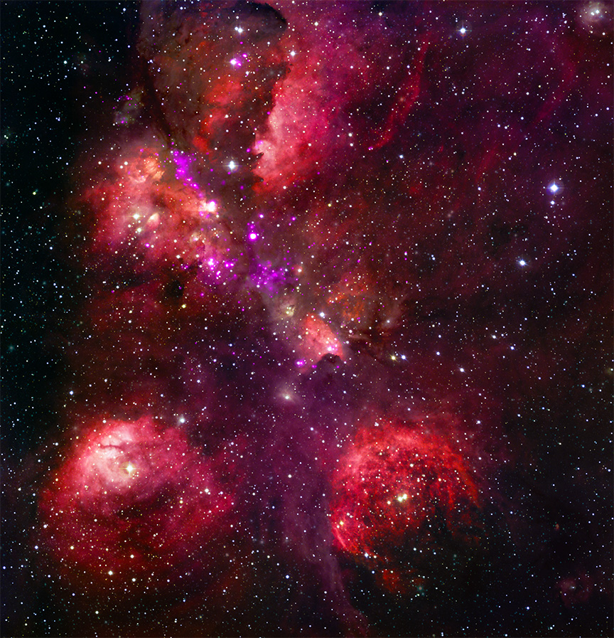  image of the Cat’s Paw nebula showing brilliant red and purple clouds blanketing a black sky packed with stars. 