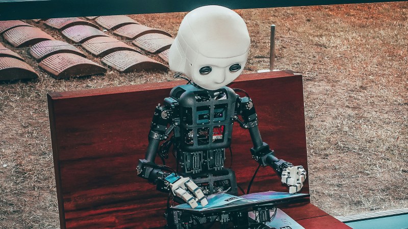 a robot using a computer