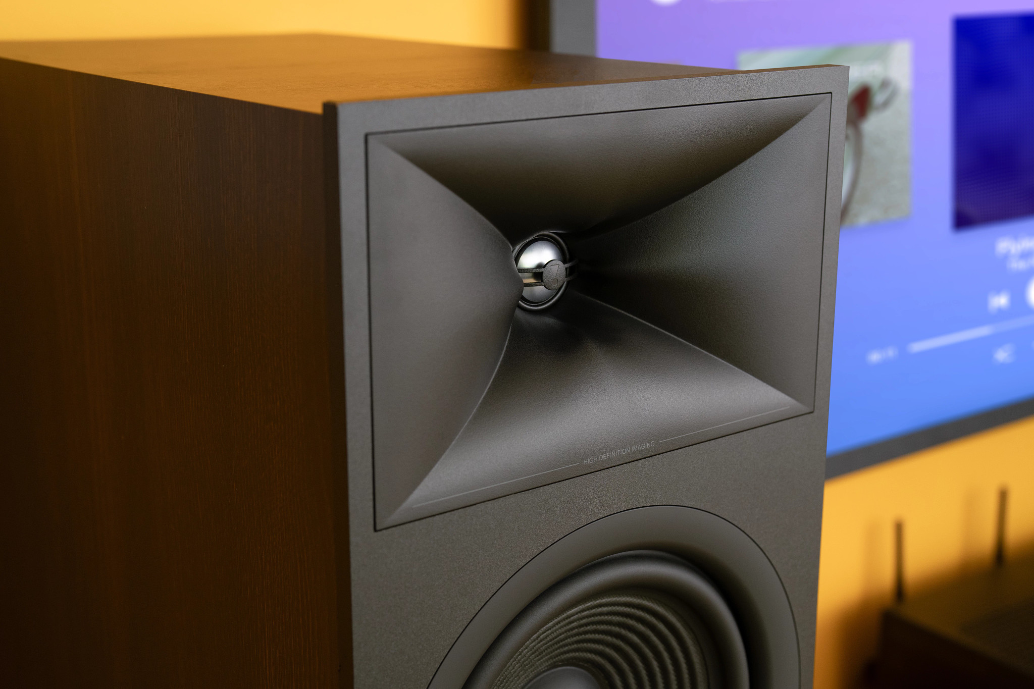 JBL exclamation point logo shown on a waveguide atop a 1-inch aluminum dome tweeter in the new Stage 2 home cinema loudspeakers