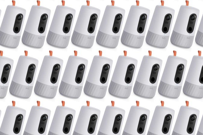 A eufy pet camera in a pattern on a plain background.