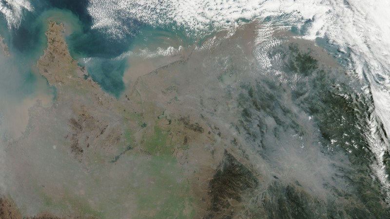 Thick clouds of fine particulate matter blow off China in this 2016 satellite photo (oriented with north to the left).