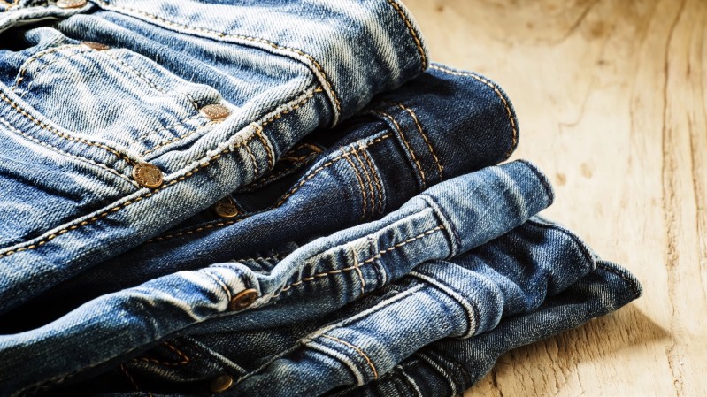 pile of denim jeans closeup