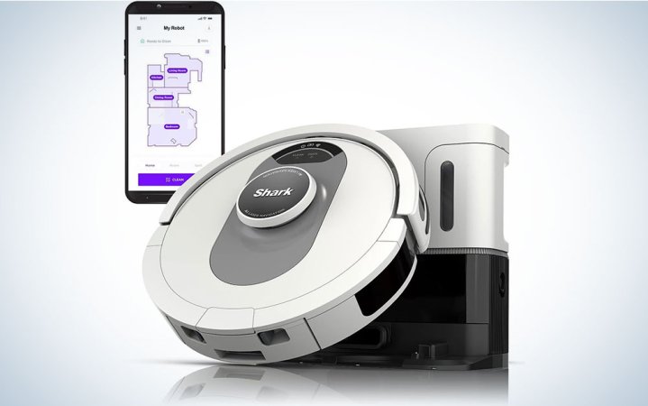  Ninja robotic vacuum with a smartphone showing its companion app