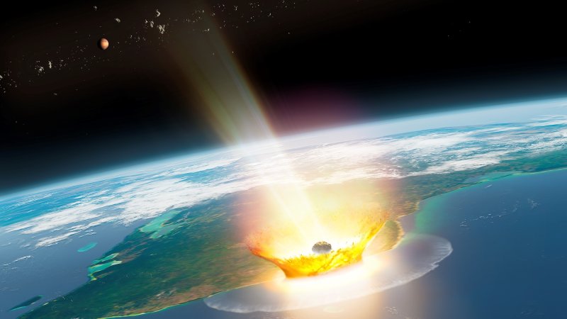 Artist impression of a large asteroid impacting on Earth such as the Chicxulub event that caused the end-Cretaceous mass extinction, 66 million years ago. The illustration shows an asteroid impacting at Chicxulub. Shown in the background are planet Mars and asteroid bodies.