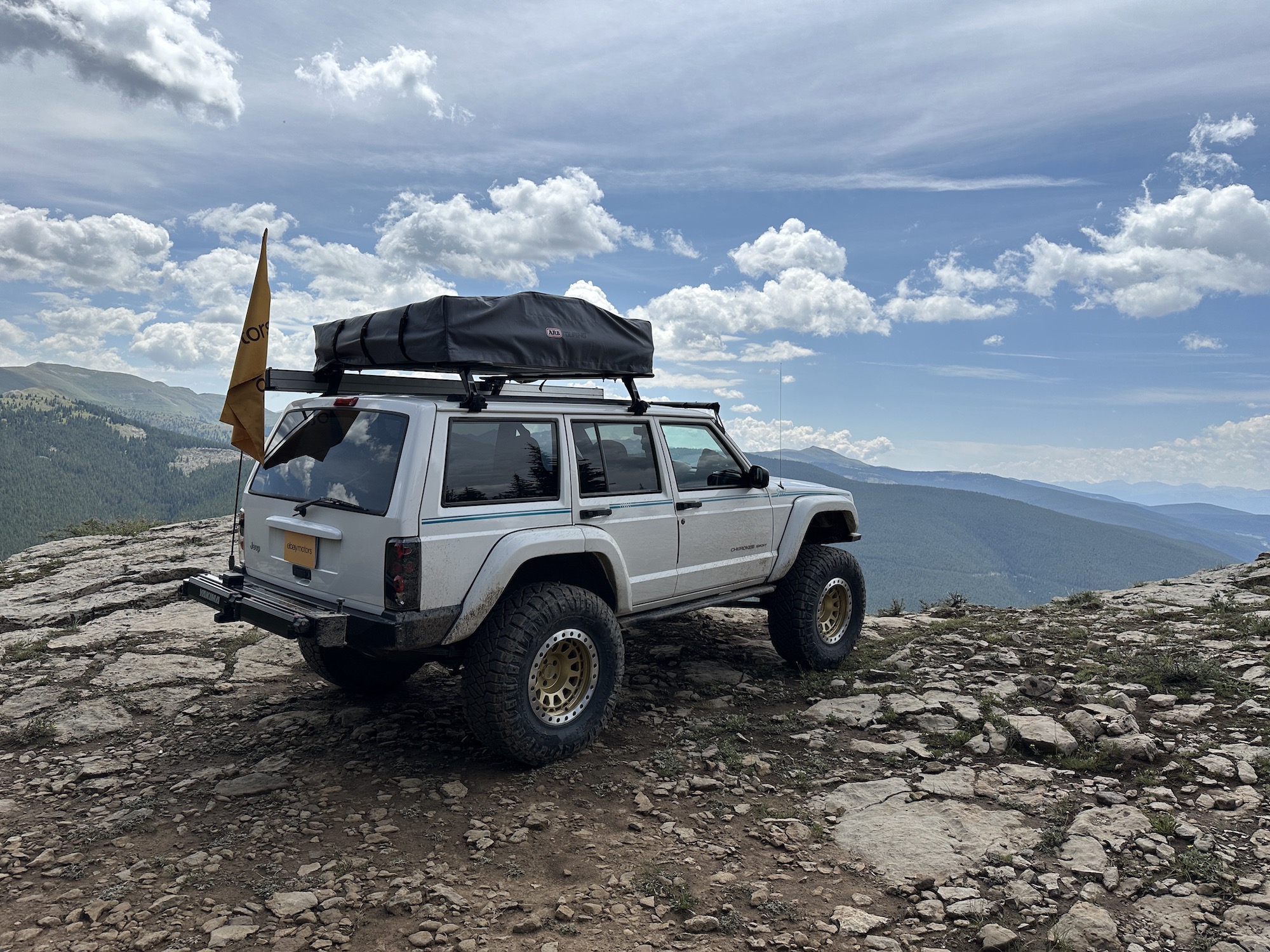 jeep on edge of cliff