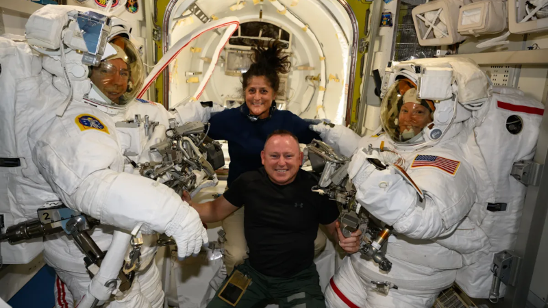 Butch Wilmore and Suni Williams with two astronauts aboard ISS